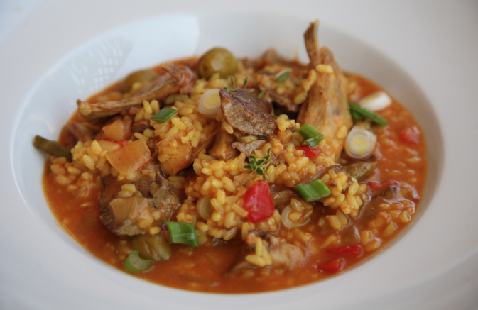 Arroz caldoso con setas shitake y conejo.